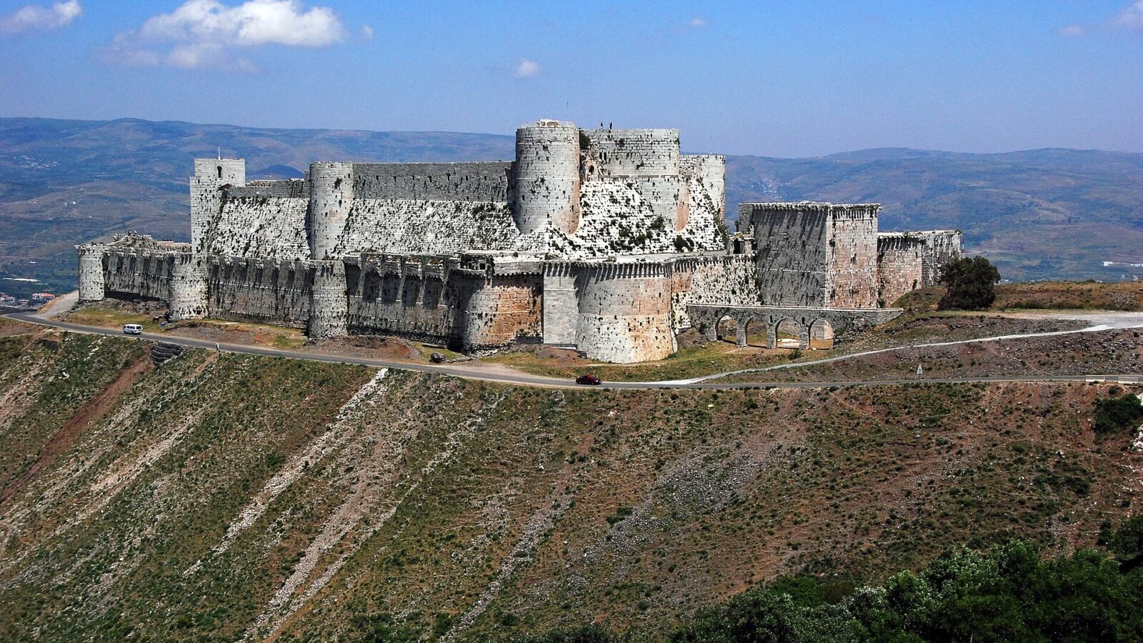 Thematic lead image: damaged buildings, border conflict — Lebanese escalation tests ceasefire durability, regional stability | National Times