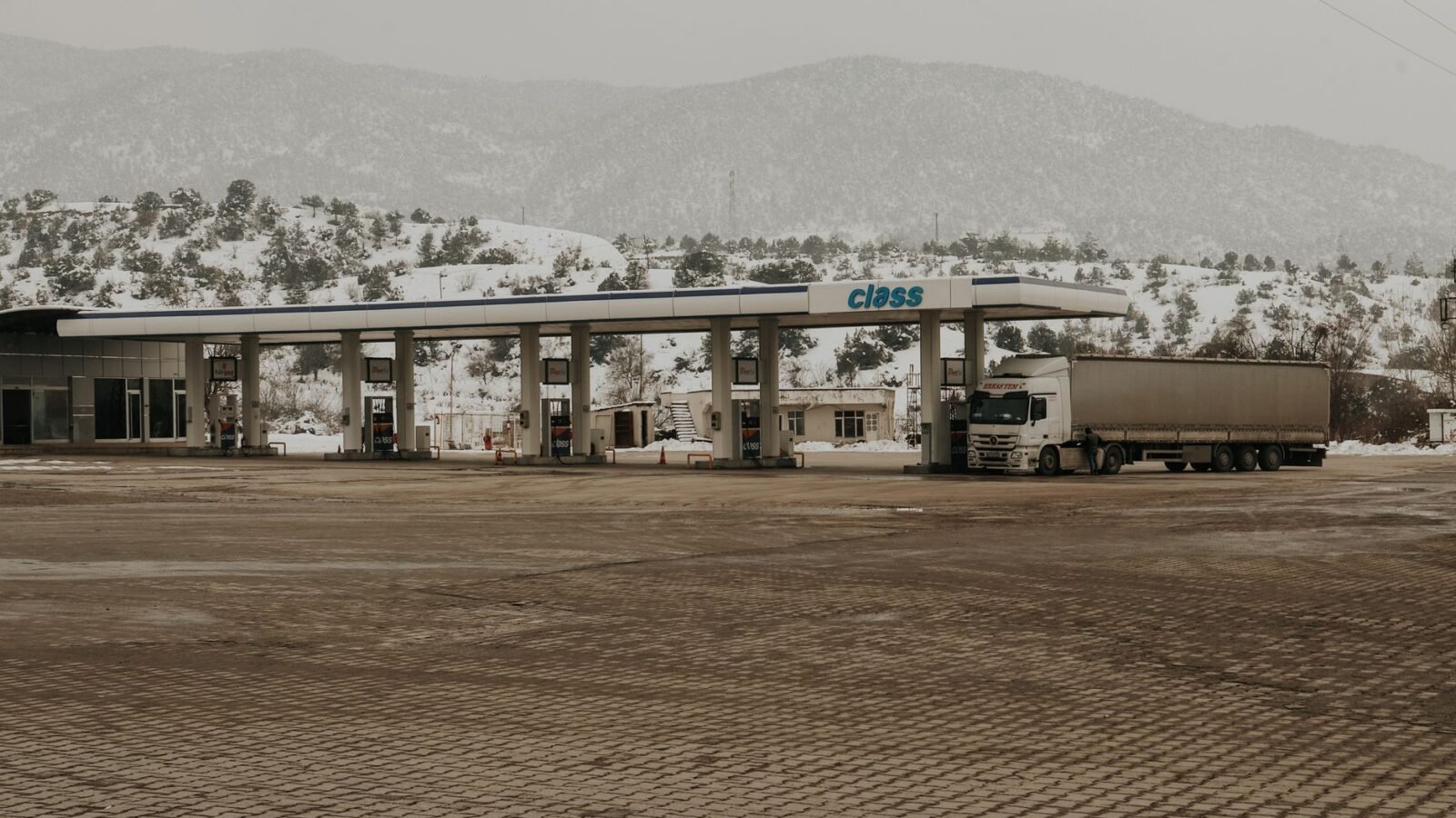 Thematic lead image: trucks, diesel, supply chain — Diesel Prices: The Pass-Through Mechanism Under Strain | National Times