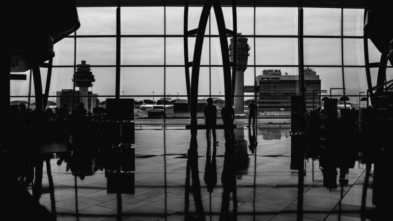 Thematic lead image: airport, sanctions, diplomacy — Iran's Flight Threats: Coercion or Signalling Amid US Sanctions? | National Times