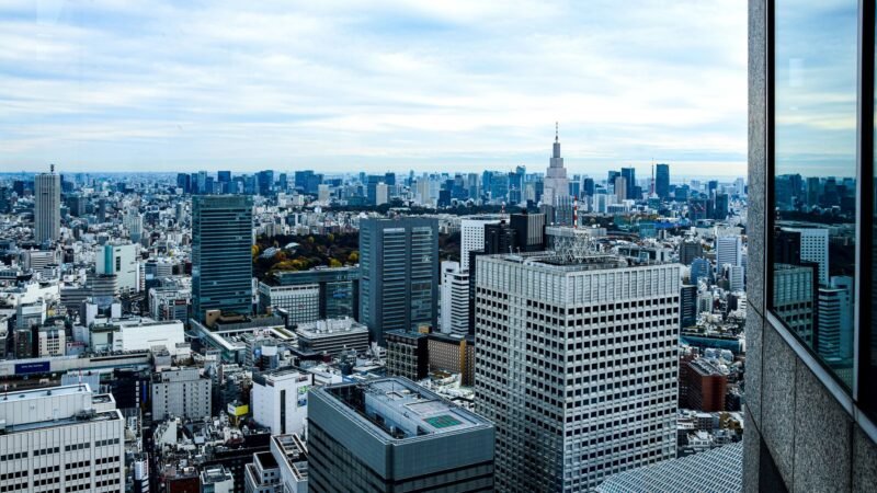 Thematic lead image: Tokyo skyline, technology, finance — Japan's AI-Yen Nexus: Pathways to Market Resurgence or Stagnation by 2030 | National Times