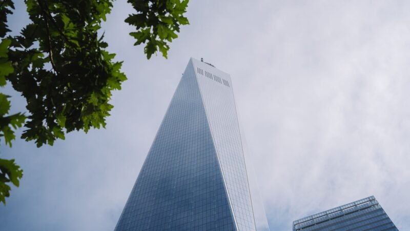 Thematic lead image: World Trade Center dust cloud — 9/11 Asbestos Revelations: Unpacking the Long-Term Liability | National Times