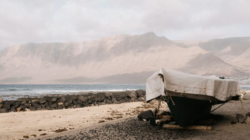 Thematic lead image: migrant boat Atlantic Ocean — Canary Islands Migrant Deaths Signal Shifting European Border Dynamics | National Times