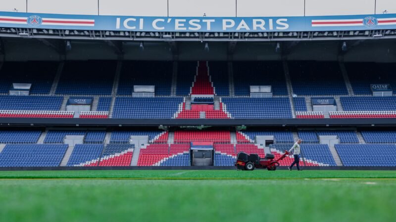 Thematic lead image: football coach stadium — PSG's Stuttering Start: Tactical Miscalculation or Inevitable Growing Pains? | National Times
