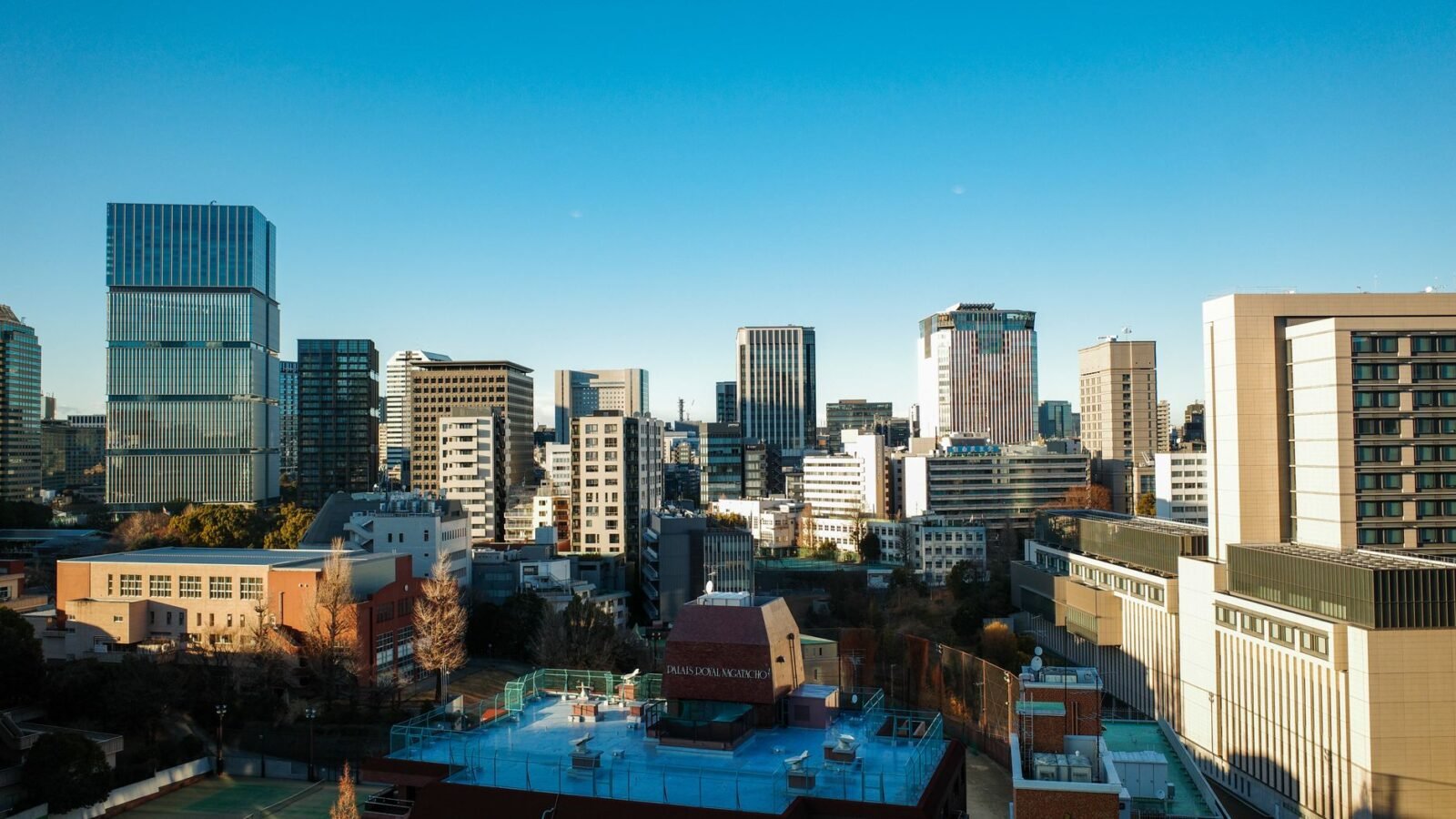Thematic lead image: financial district, economic indicators — Japan's PPI Surge: A Test for BOJ's Rate Normalisation Path | National Times