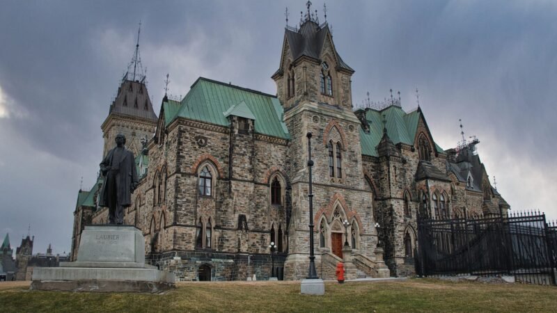 Thematic lead image: Canadian Parliament building — Canada's Investment Summit: A Hedged Bet Against US Economic Influence | National Times