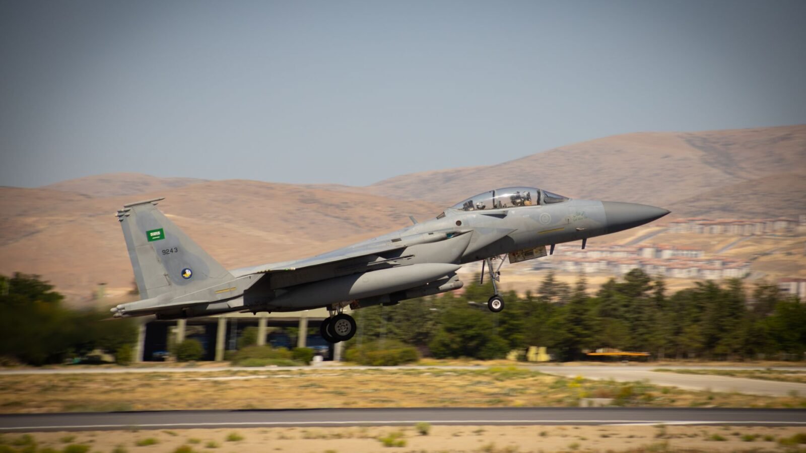 Thematic lead image: F-15 fighter jet in desert landscape — F-15 Sale to Saudi Arabia: Red Sea Stability to 2030 | National Times