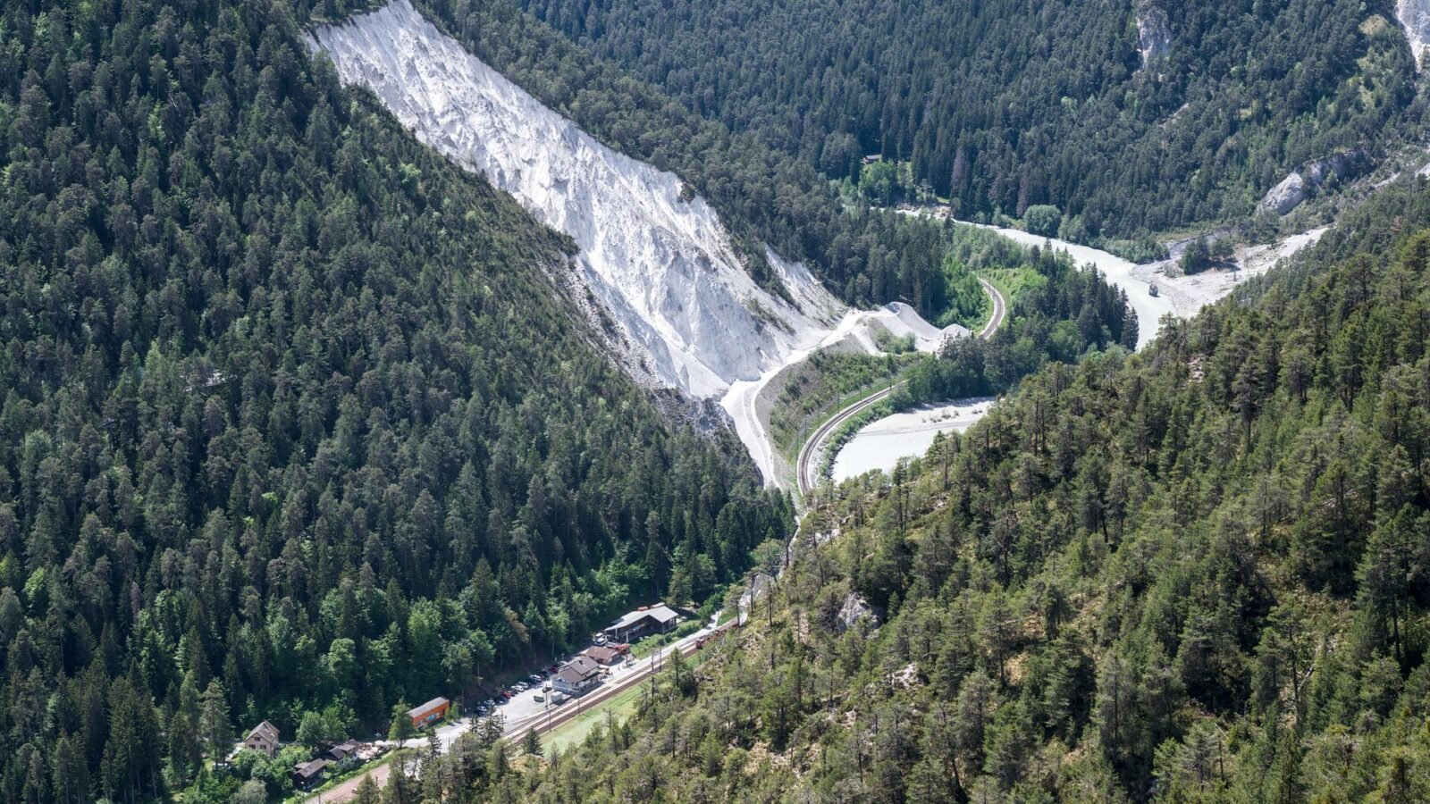 Thematic lead image: overturned coach, mountain road — Swiss Alps coach crash raises questions of regulation versus driver agency | National Times