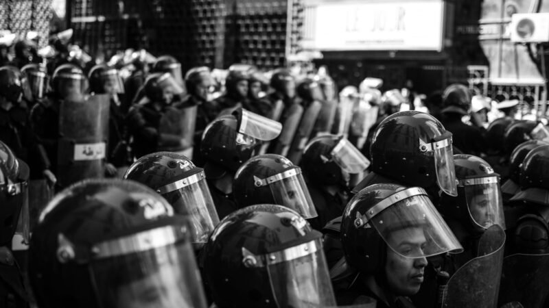 Thematic lead image: protest, police, government — France's Police Powers Debate: Three Scenarios to 2030 | National Times