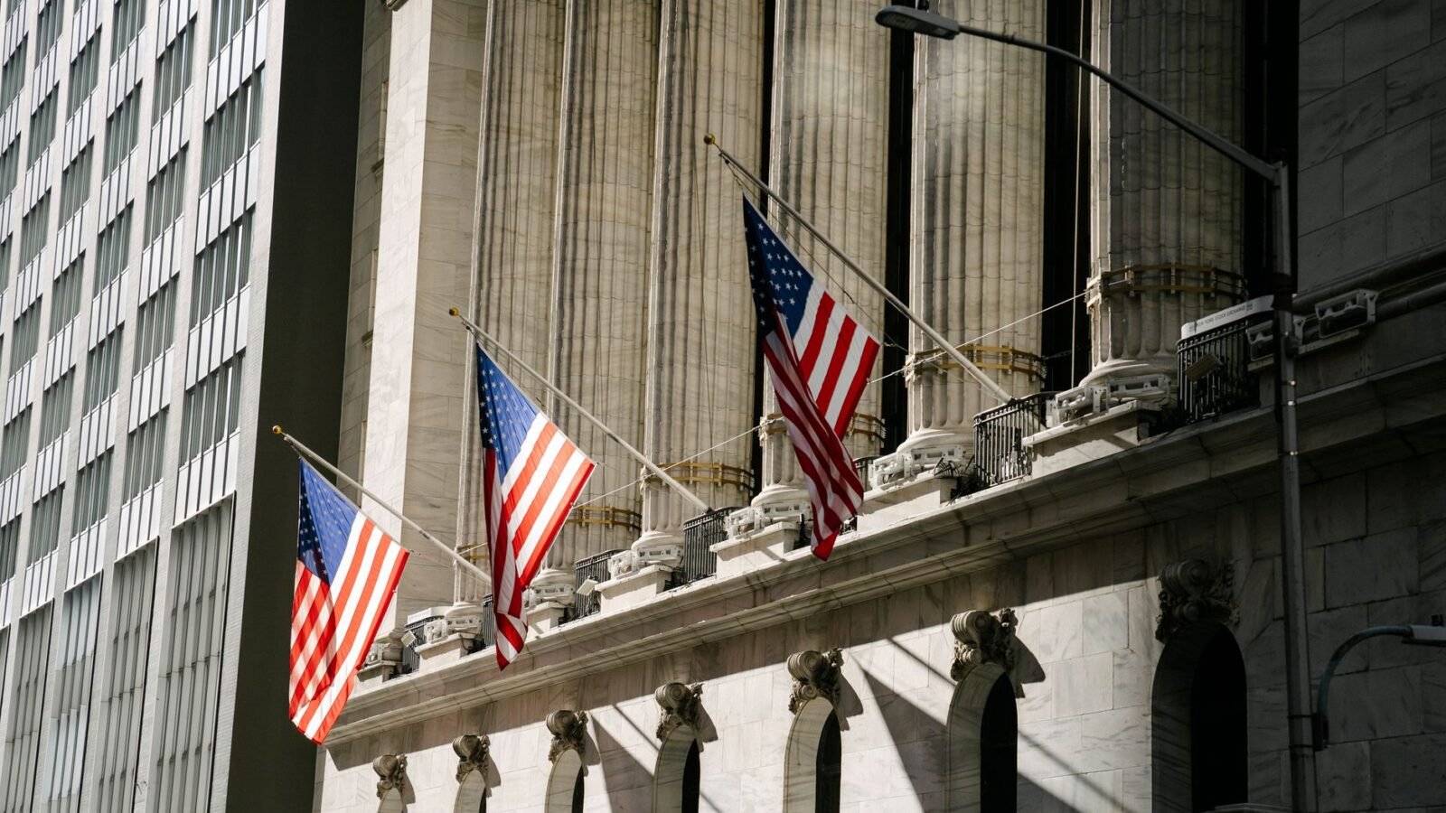 Thematic lead image: stock exchange building — NSE IPO Discount Challenges Private Market Valuations | National Times