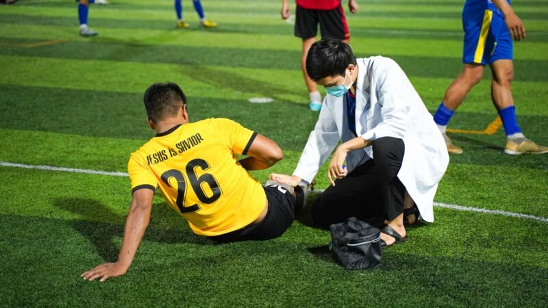 Thematic lead image: football player head injury — Football's Head Injury Protocol: Towards a 2030 Reckoning | National Times