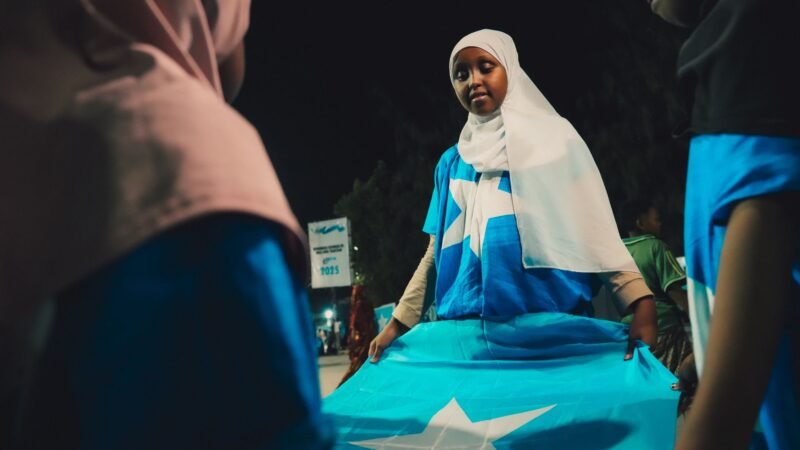 Thematic lead image: UN mission withdrawal, Somali flag — UN Somalia Mission Closure: A Milestone or a Retreat? | National Times