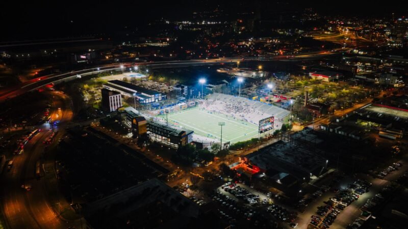 Thematic lead image: football stadium lights — European Football's 2030 Horizon: Geopolitical Friction and Financialisation | National Times