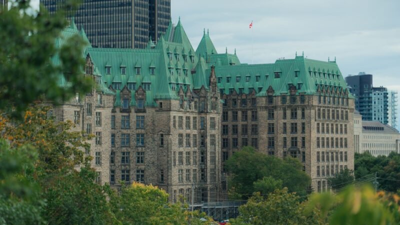 Thematic lead image: parliament, justice, medical policy — Canada's Assisted Dying Expansion: A Precarious Pause on Medical Ethics | National Times